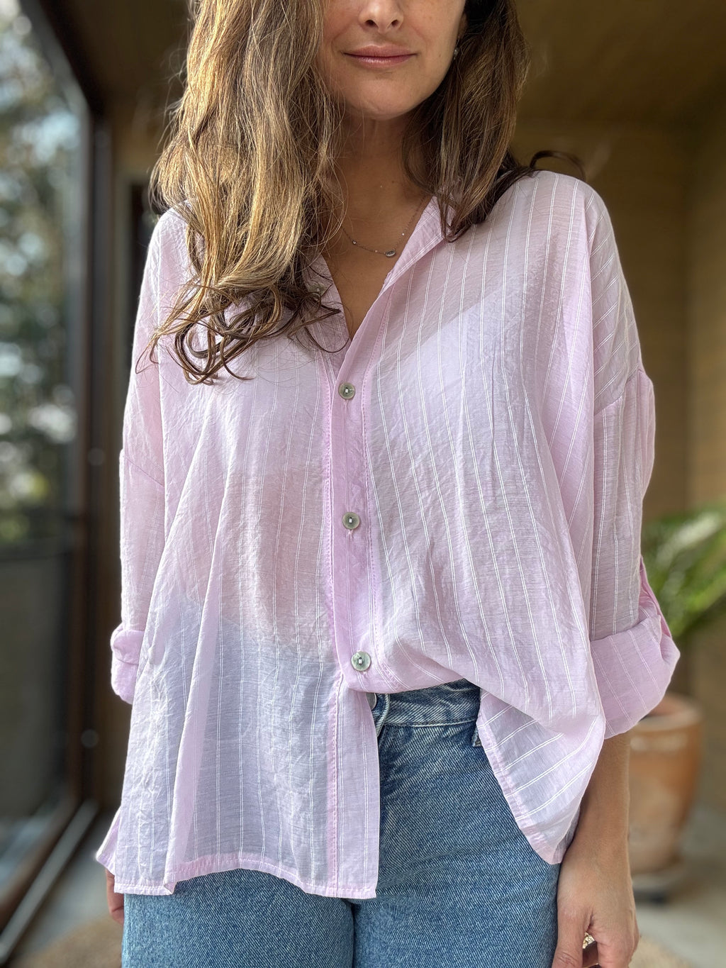 Camisa fluida líneas rosado