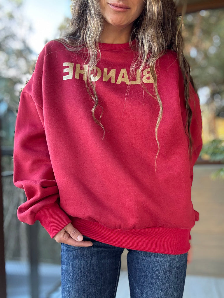 Polerón blanche rojo