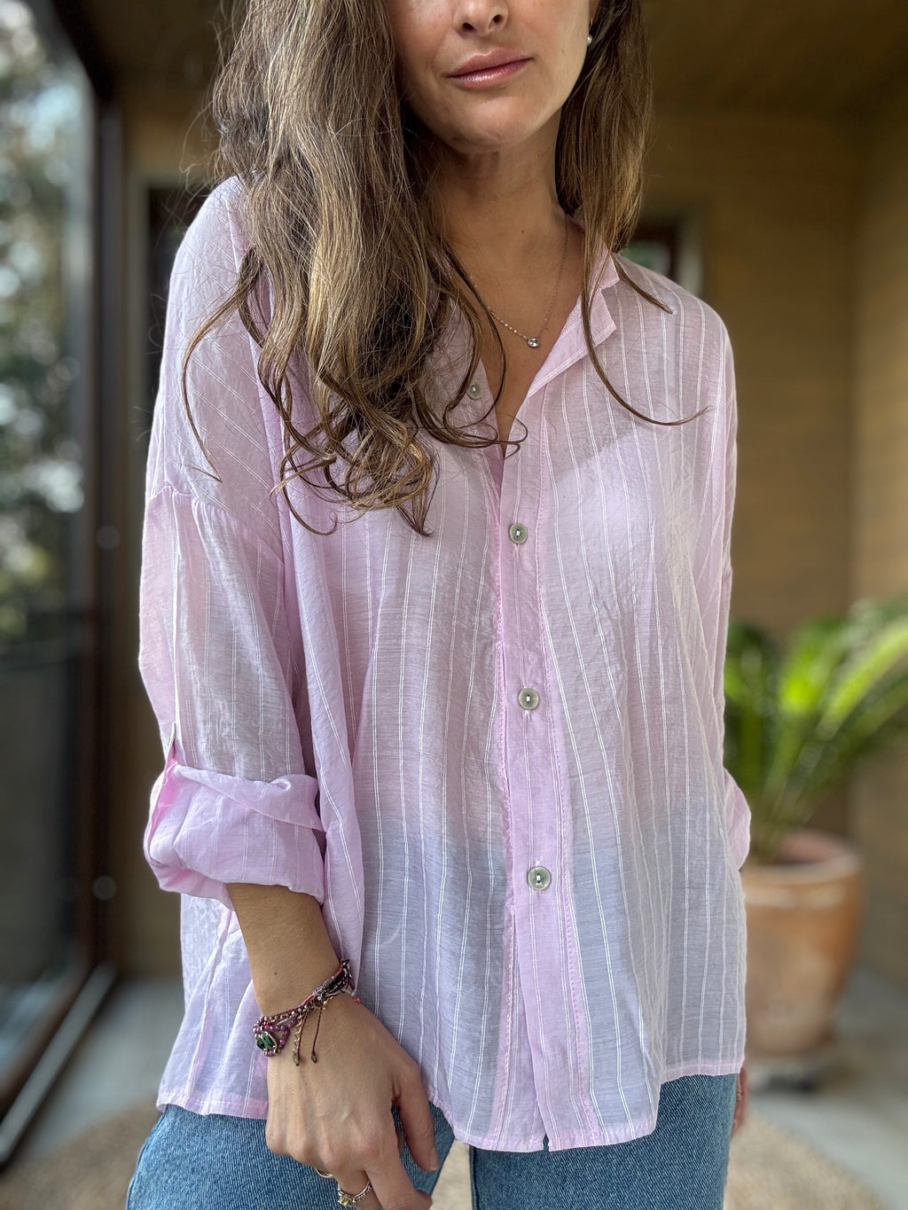 Camisa fluida líneas rosado
