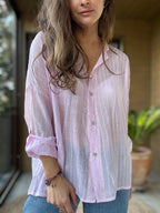 Camisa fluida líneas rosado