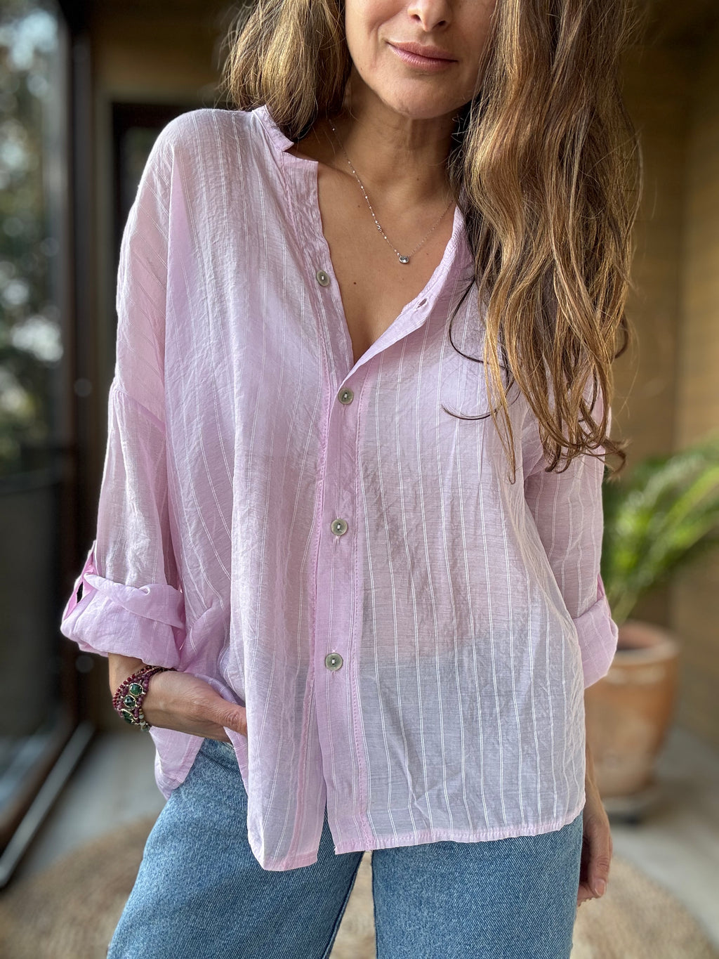 Camisa fluida líneas rosado