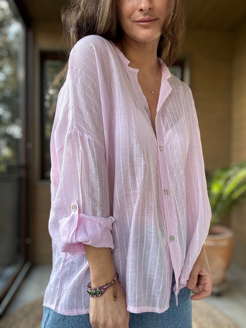 Camisa fluida líneas rosado