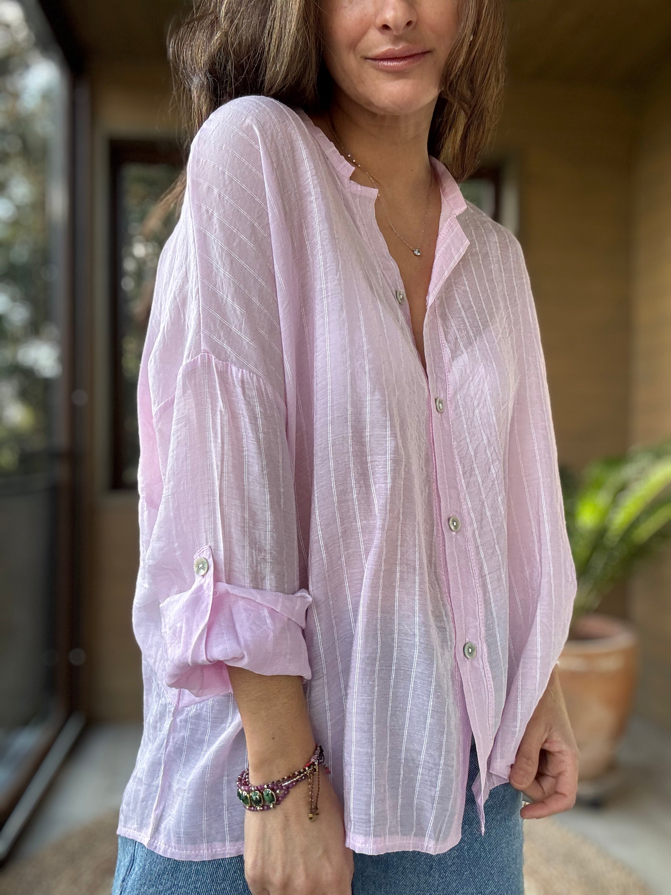 Camisa fluida líneas rosado