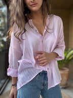 Camisa fluida líneas rosado