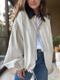 Chaqueta cuello negro