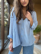 Camisa fluida líneas celeste