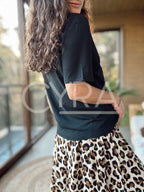Polera tachas negro