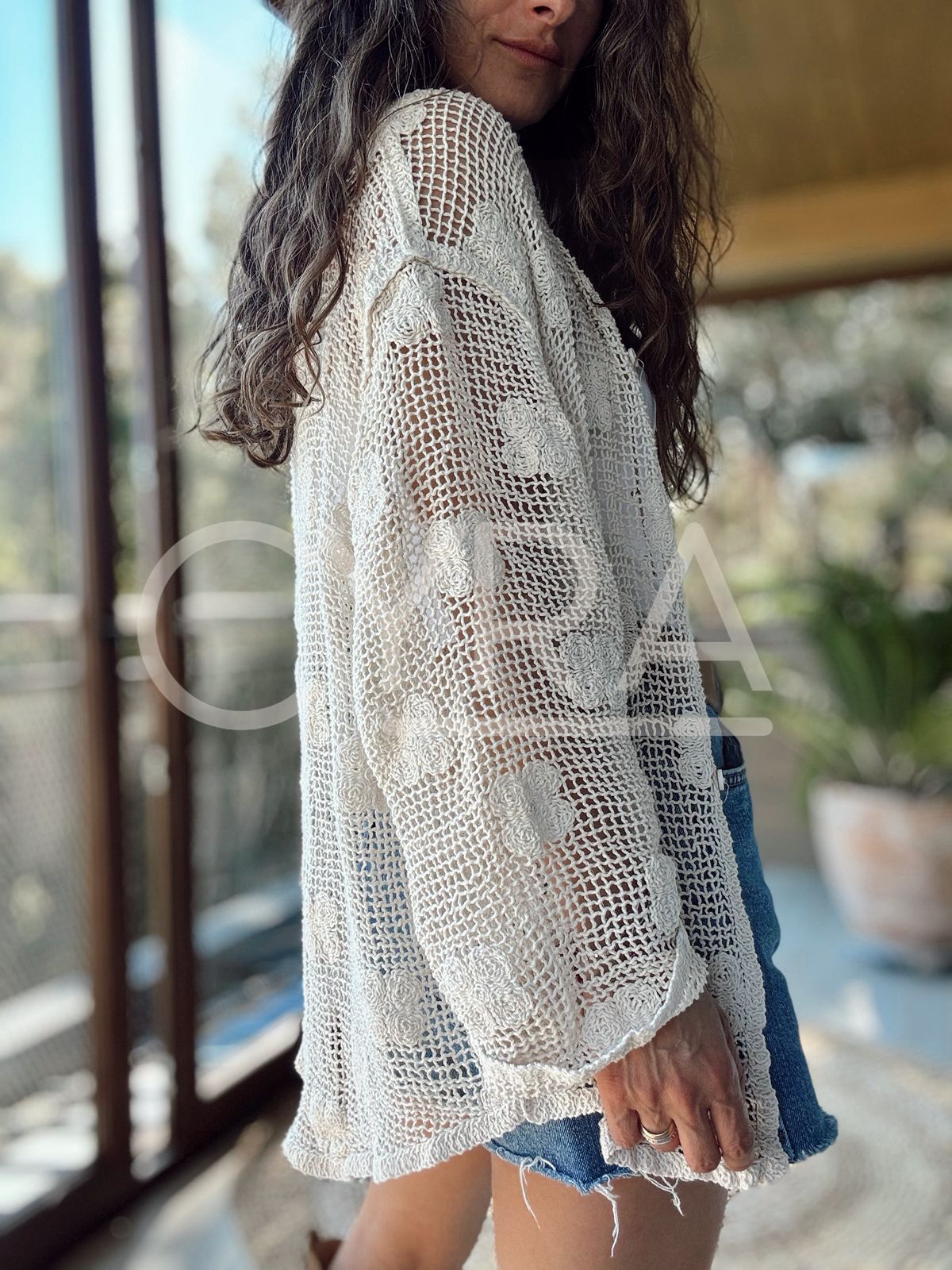 Chaleco hilo flores crudo